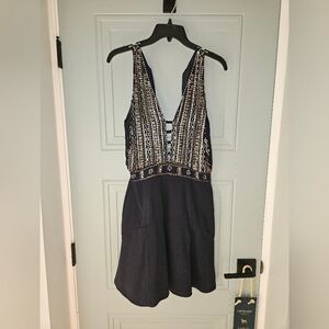 Black Sleeveless Dress with Silver Embellishments